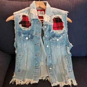 Never worn, sleeveless jean jacket